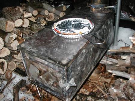 Cooking Jiffy Pop on the wood stove